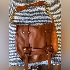 brown genuine leather purse with gold accents by Sabina